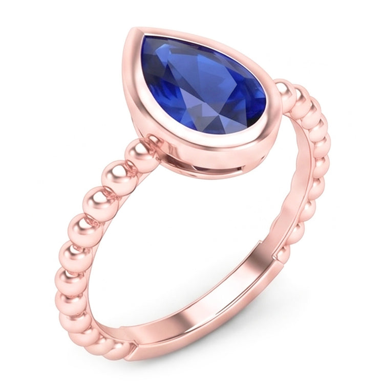 Bague Solitaire Or Rose Poire Saphir Bleu 1.50 Carats Lunette Sertie