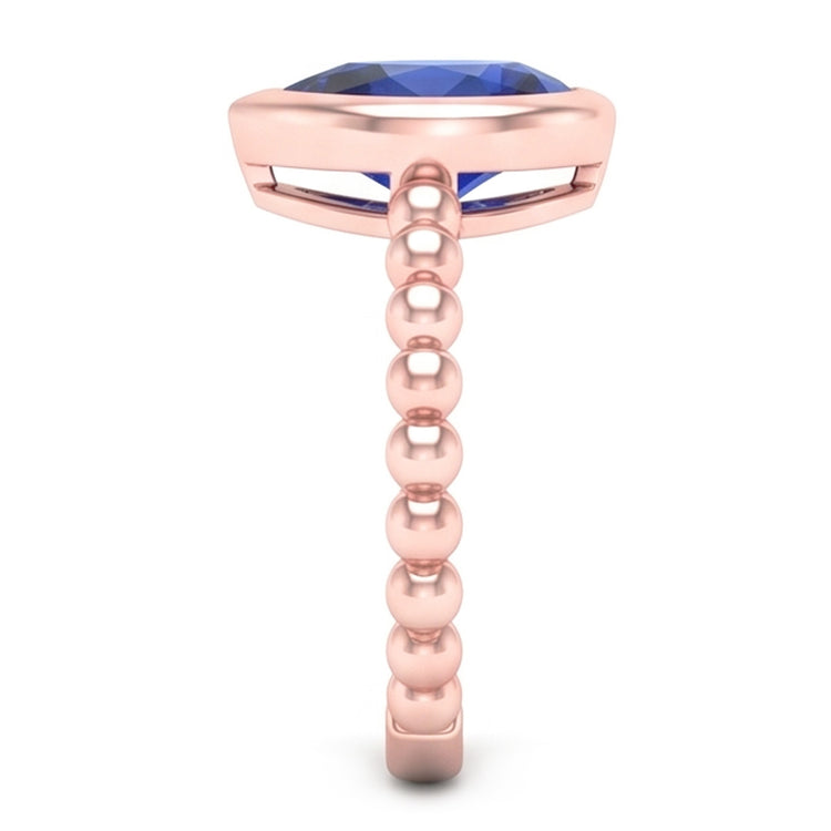 Bague Solitaire Or Rose Poire Saphir Bleu 1.50 Carats Lunette Sertie