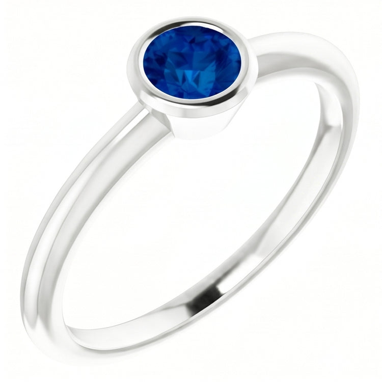 Bague Solitaire Saphir Bleu 0.75 Carats Sertissage Lunette Or Blanc 14K