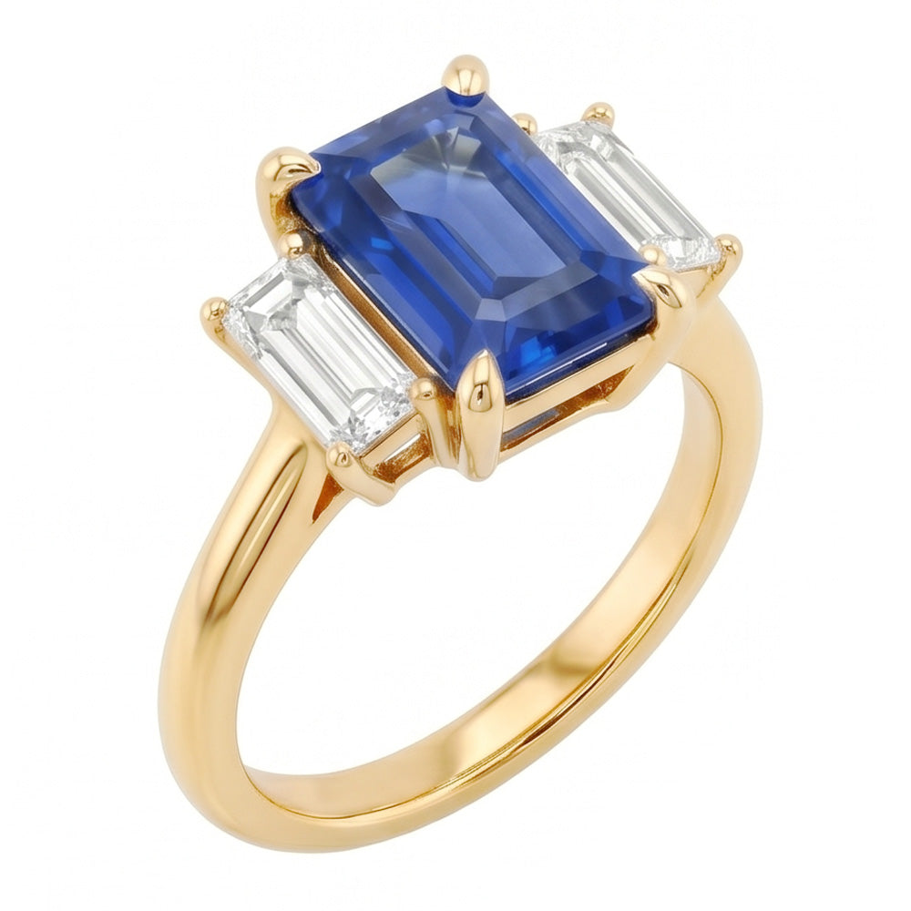 Bague de fiançailles 3 pierres saphir bleu émeraude et taille baguette 3 carats