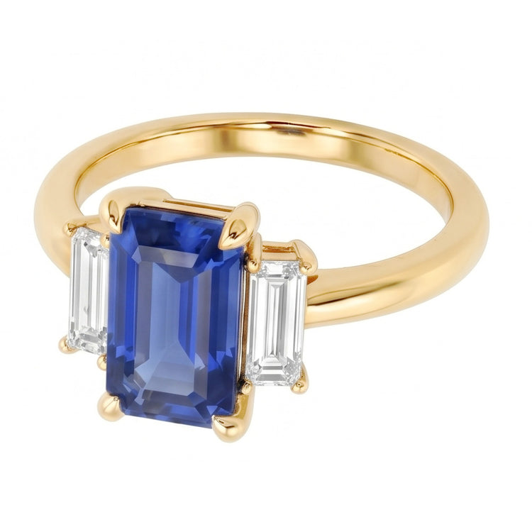 Bague de fiançailles 3 pierres saphir bleu émeraude et taille baguette 3 carats