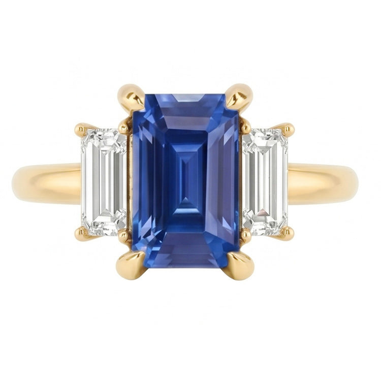 Bague de fiançailles 3 pierres saphir bleu émeraude et taille baguette 3 carats
