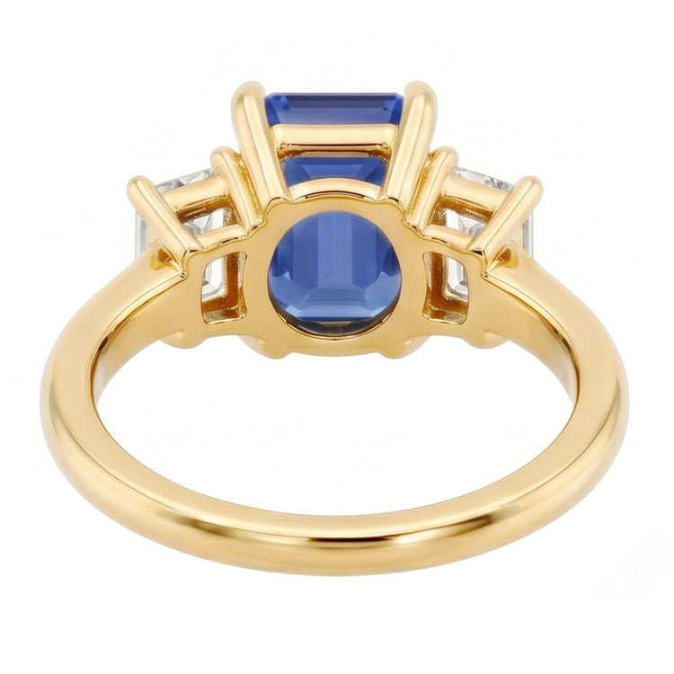 Bague de fiançailles 3 pierres saphir bleu émeraude et taille baguette 3 carats