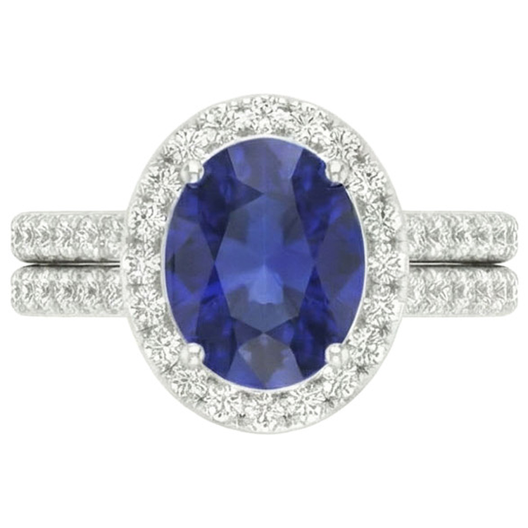 Bague de fiançailles avec halo de saphir bleu ovale sertie en or blanc 10.25 carats