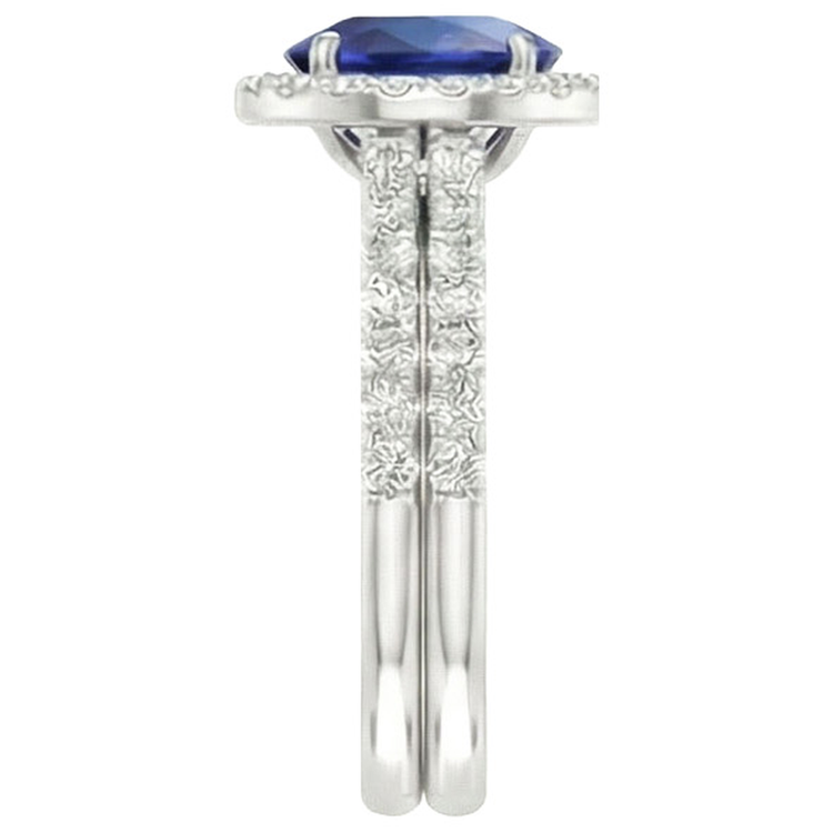 Bague de fiançailles avec halo de saphir bleu ovale sertie en or blanc 10.25 carats