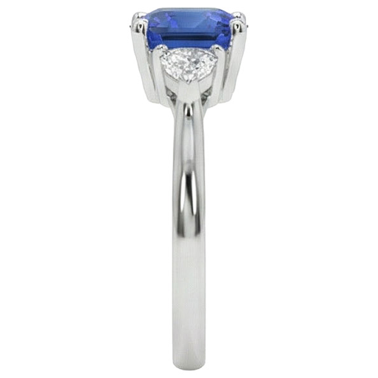 Bague de fiançailles diamant 3 pierres avec un saphir bleu 2.75 carats Nouveau