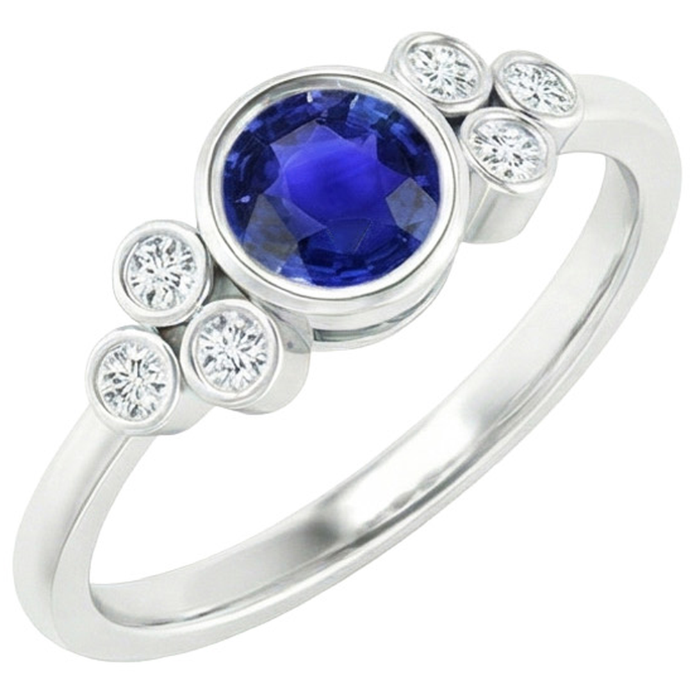 Bague de fiançailles en saphir de Ceylan et diamants sertis clos en or 1.75 carats