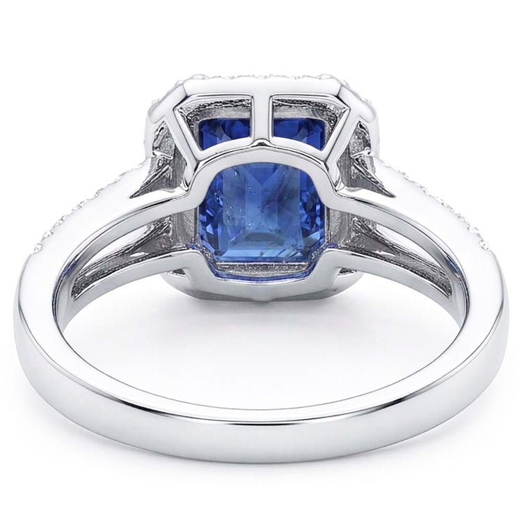 Bague de fiançailles halo émeraude saphir bleu 4 carats double tige