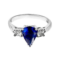 Bague de fiançailles trois pierres poire saphir bleu et diamant 4.20 ct.