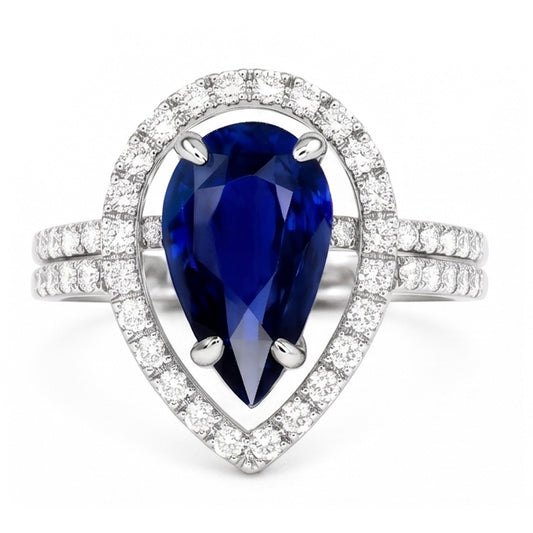 Bague de mariage Halo en or et diamants sertie au centre de saphir bleu poire 4 carats