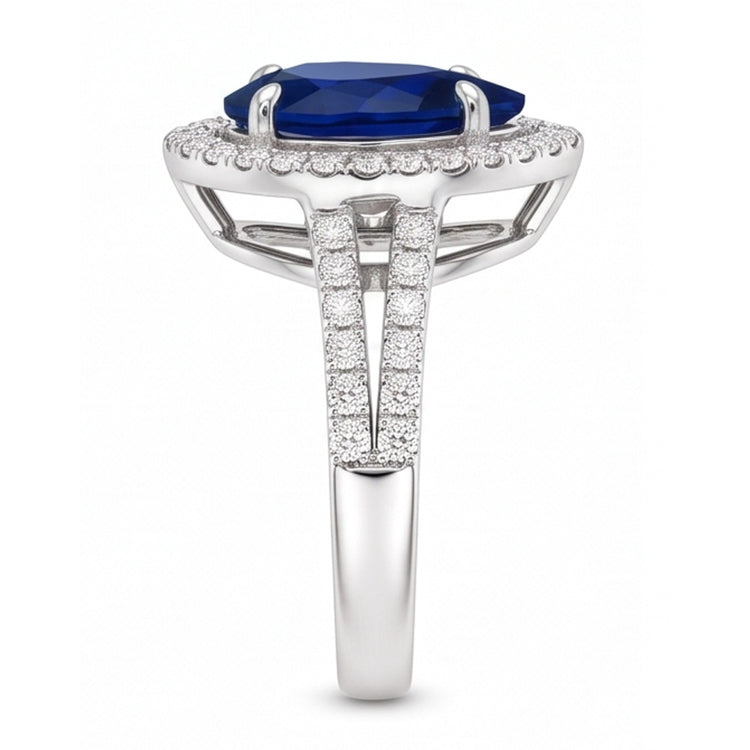 Bague de mariage Halo en or et diamants sertie au centre de saphir bleu poire 4 carats