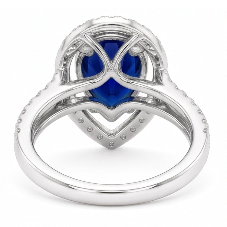 Bague de mariage Halo en or et diamants sertie au centre de saphir bleu poire 4 carats