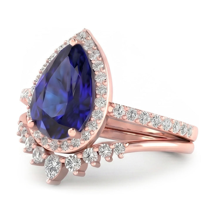 Bague de mariage Halo poire sertie saphir bleu profond et diamants 4.50 carats