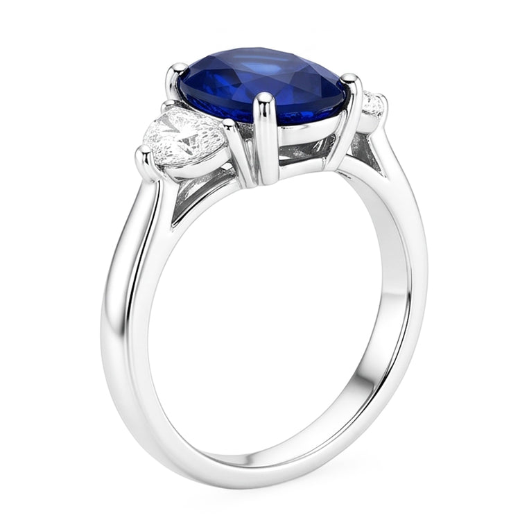 Bague diamant 3 pierres avec saphir bleu profond ovale en or 8.25 carats 14K