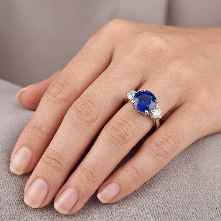 Bague diamant rond trois pierres saphir bleu profond 2.50 carats bijoux