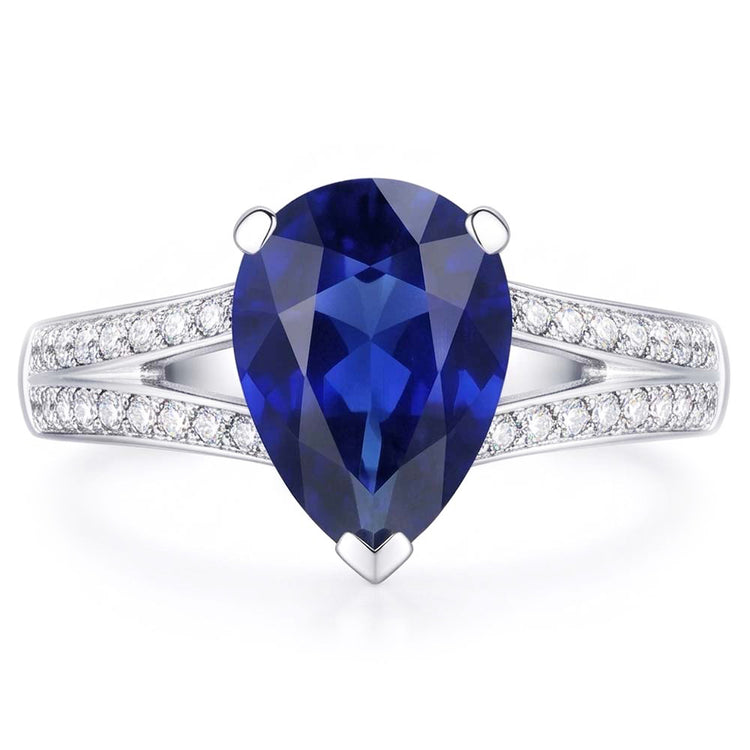 Bague diamant saphir bleu tige fendue 3 carats or blanc 14K