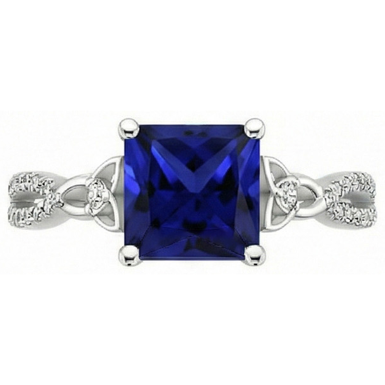 Bague diamant taille princesse saphir bleu tige torsadée en or 4 carats