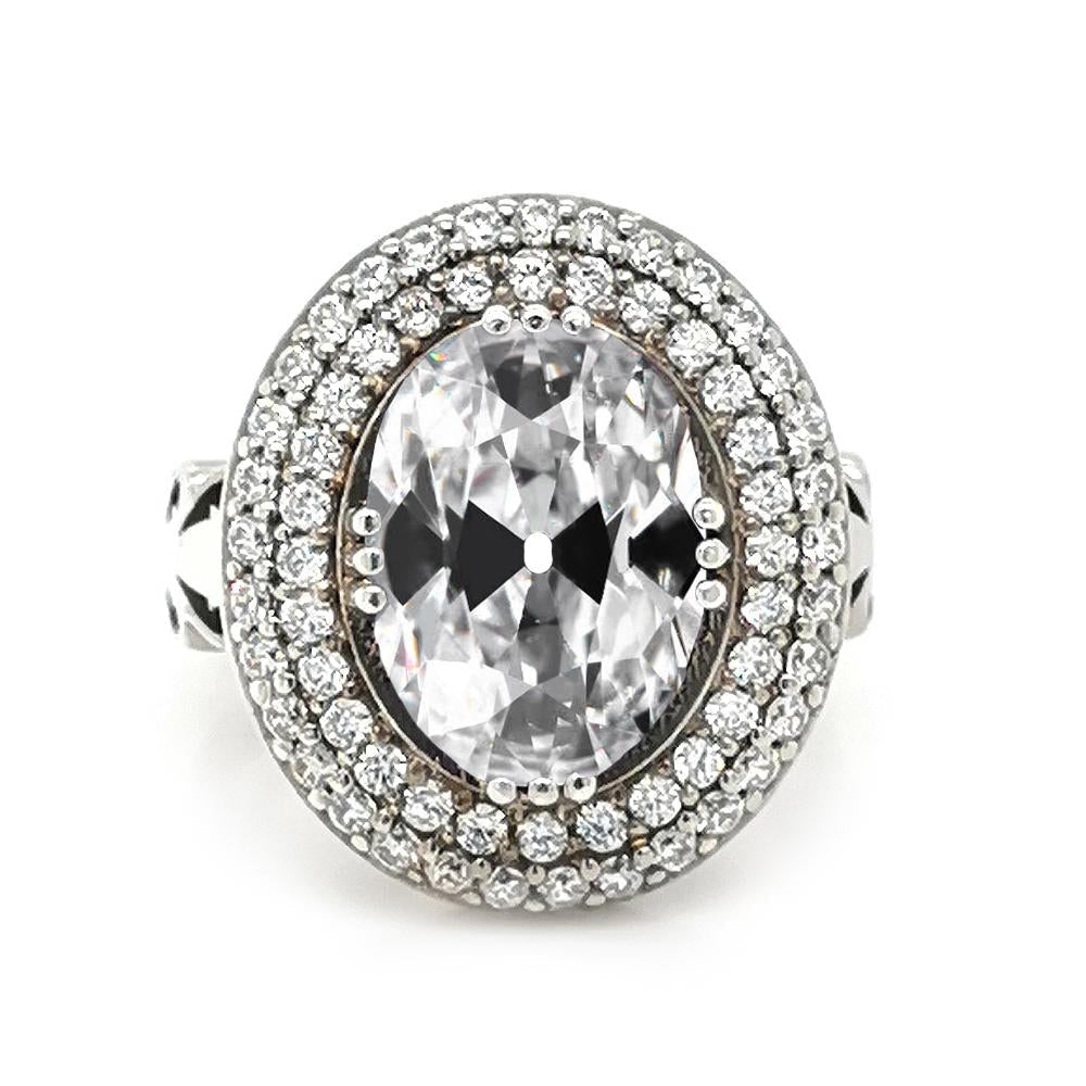 Bague double halo ovale Naturel diamant taille ancienne sertie triple griffes 8 carats