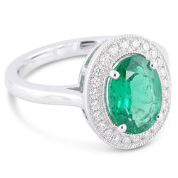 Bague émeraude verte et halo de diamants