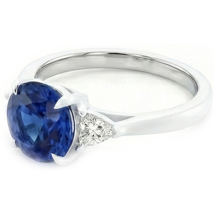 Bague en or 3 pierres rondes saphir bleu et mille milliards de diamants 2.50 carats