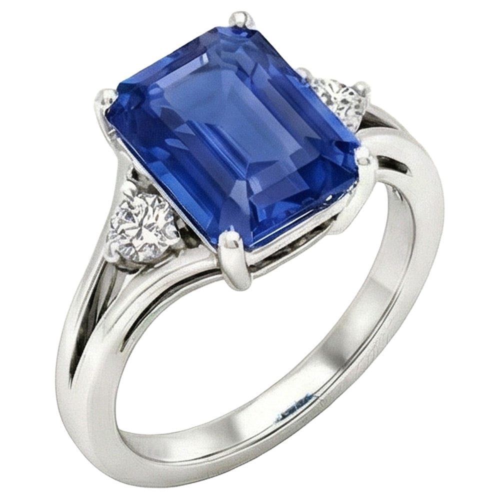 Bague en or à trois pierres et saphir bleu émeraude 2.50 carats tige fendue