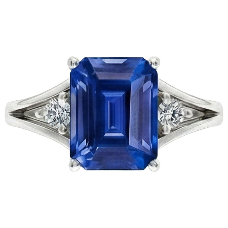 Bague en or à trois pierres et saphir bleu émeraude 2.50 carats tige fendue
