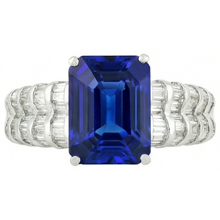 Bague en or blanc avec saphir de Ceylan de 7.51 ct et émeraude et diamants baguette