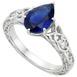 Bague en or style vintage tige filigrane poire saphir bleu 5.25 carats