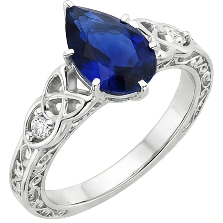 Bague en or style vintage tige filigrane poire saphir bleu 5.25 carats