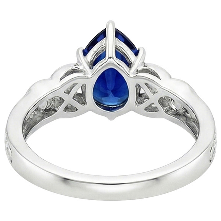 Bague en or style vintage tige filigrane poire saphir bleu 5.25 carats