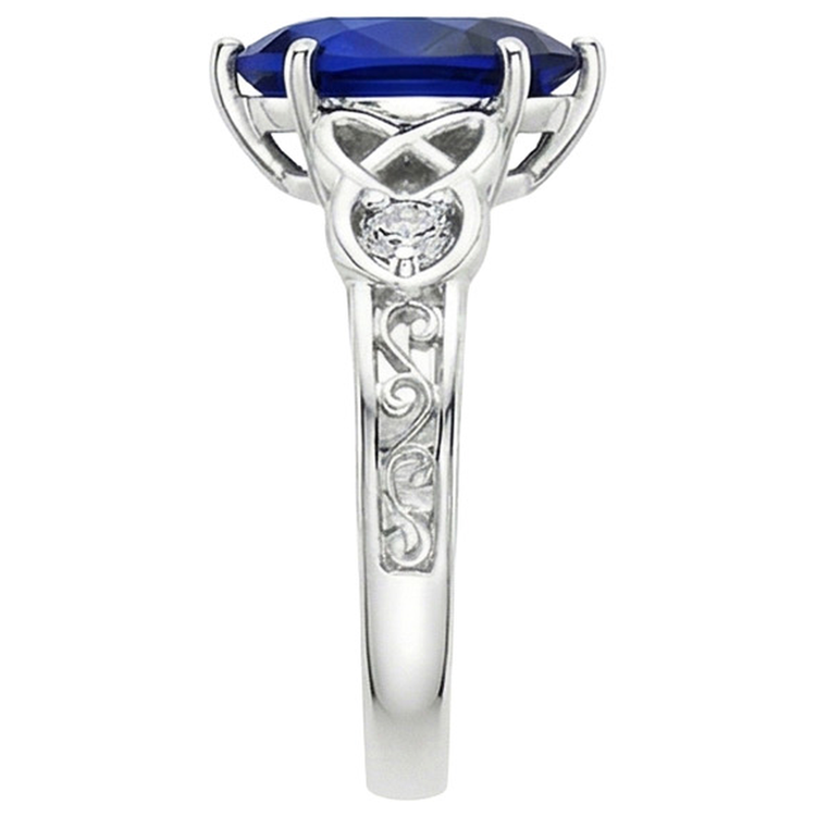 Bague en or style vintage tige filigrane poire saphir bleu 5.25 carats