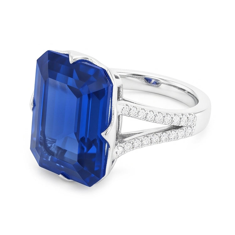 Bague en pierres précieuses saphir bleu émeraude tige fendue 5.50 carats bijoux