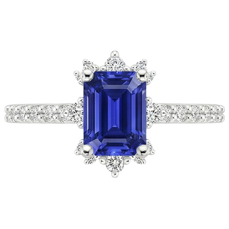Bague en saphir bleu et diamants. solitaire émeraude de 4.25 carats avec accents