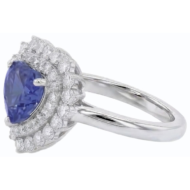 Bague en saphir bleu naturel avec halo de diamants. style étoile 3 carats