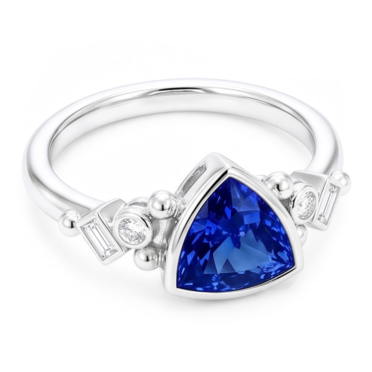 Bague en saphir bleu serti de trillions de pierres précieuses. diamants baguette 2 carats