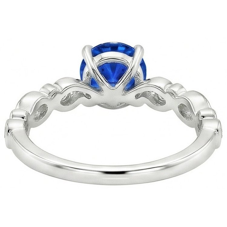 Bague en saphir rond bleu de 1.60 ct et diamants