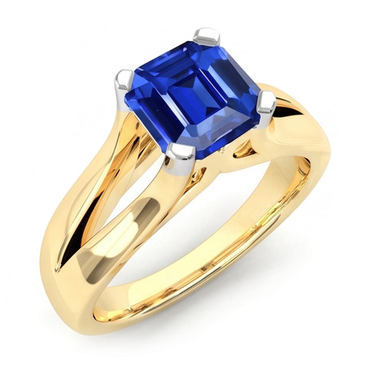 Bague saphir bleu émeraude solitaire à deux tons. tige fendue de 2.50 carats