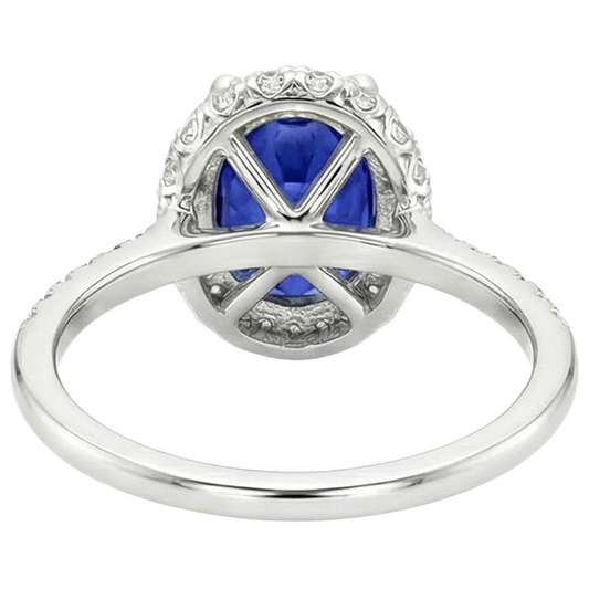 Bague saphir bleu halo taille ovale et serti de diamants 3.75 carats