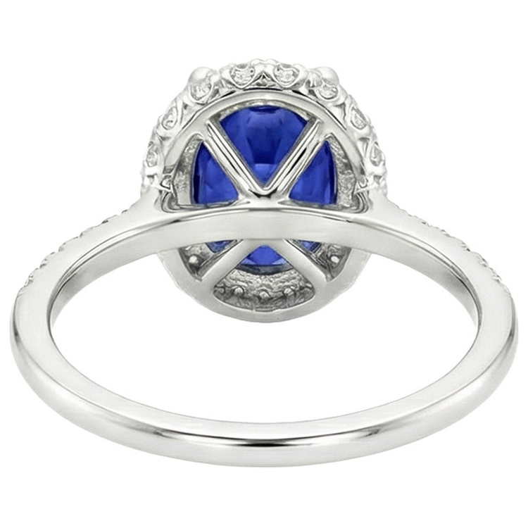 Bague saphir bleu halo taille ovale et serti de diamants 3.75 carats