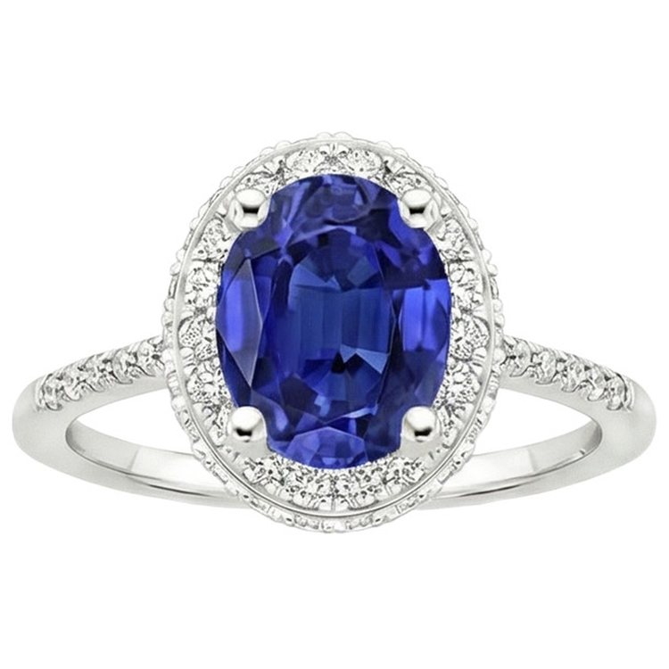 Bague saphir bleu halo taille ovale et serti de diamants 3.75 carats
