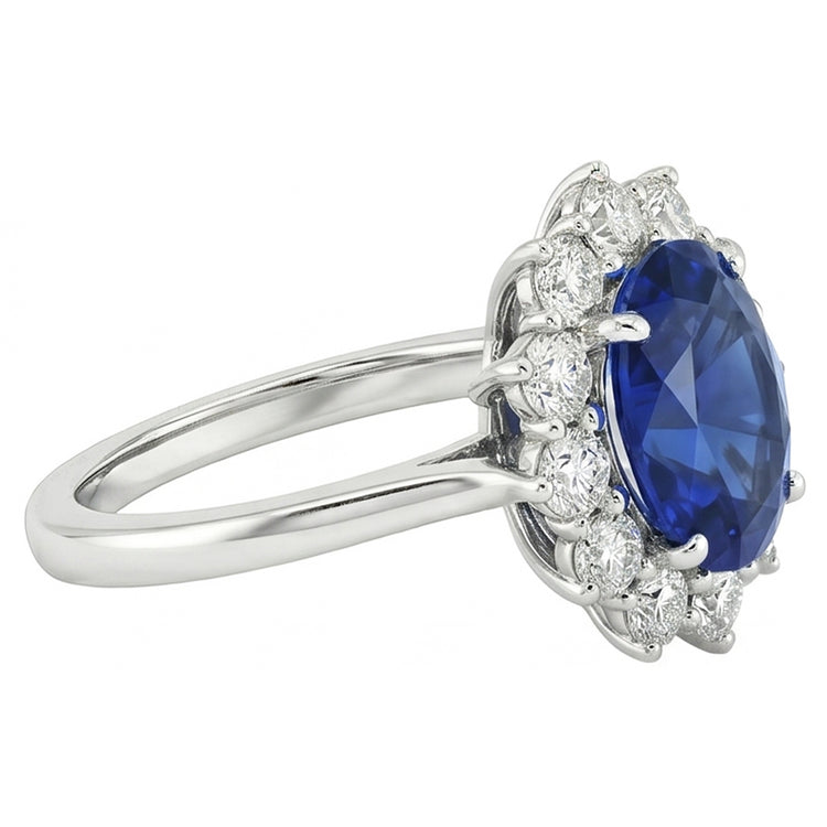 Bague saphir bleu ovale et halo de diamants ronds 6,50 ct. Or Blanc 14K