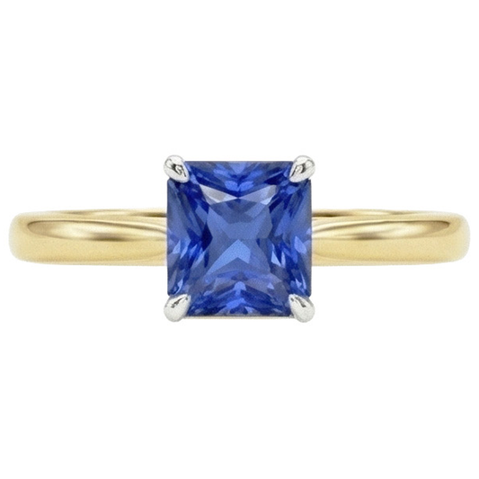 Bague saphir bleu solitaire à deux tons. tige conique 1.50 carats