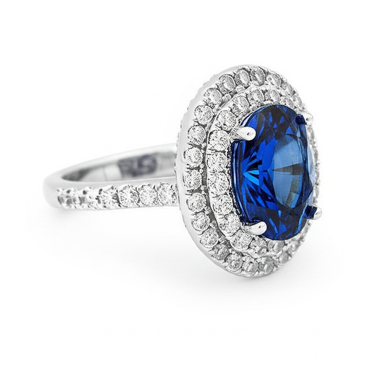 Bague saphir de Ceylan ovale de 3.40 ct avec diamants ronds en or blanc