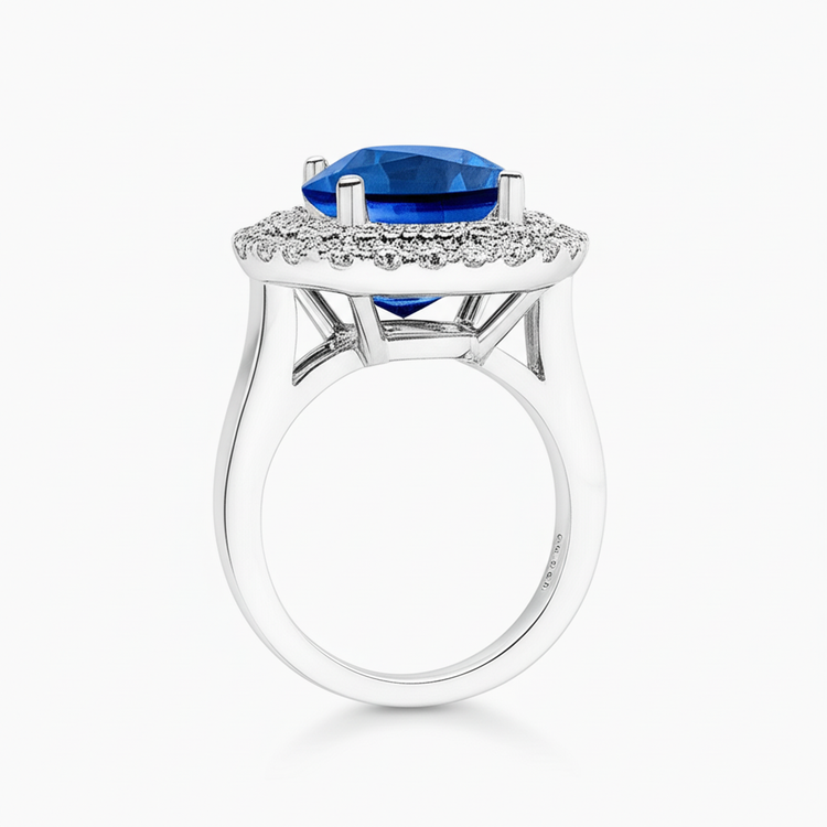 Bague saphir de Ceylan ovale de 3.40 ct avec diamants ronds en or blanc