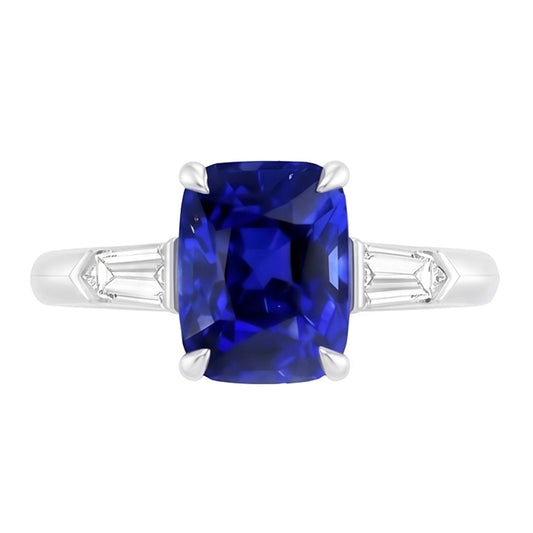 Bague saphir émeraude à trois pierres. diamant baguette conique de 3.50 carats