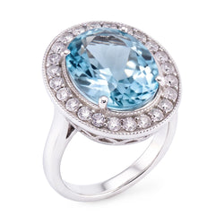 Bague sertie de griffes 11 carats aigue-marine ronde et diamants or blanc 14K