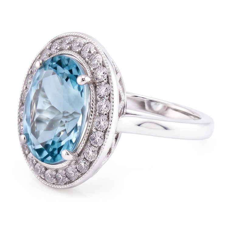 Bague sertie de griffes 11 carats aigue-marine ronde et diamants or blanc 14K