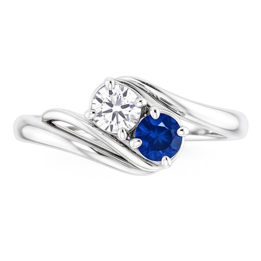 Bague sertie diamant rond saphir bleu serti 1.50 carat