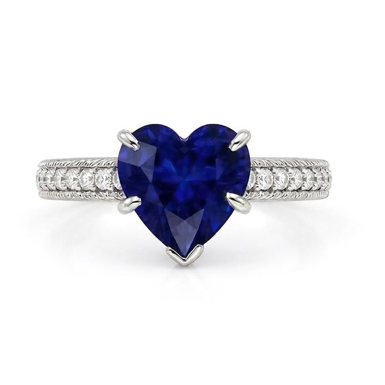 Bague solitaire en saphir de Ceylan et serti pavé. accents de diamants 2.50 carats