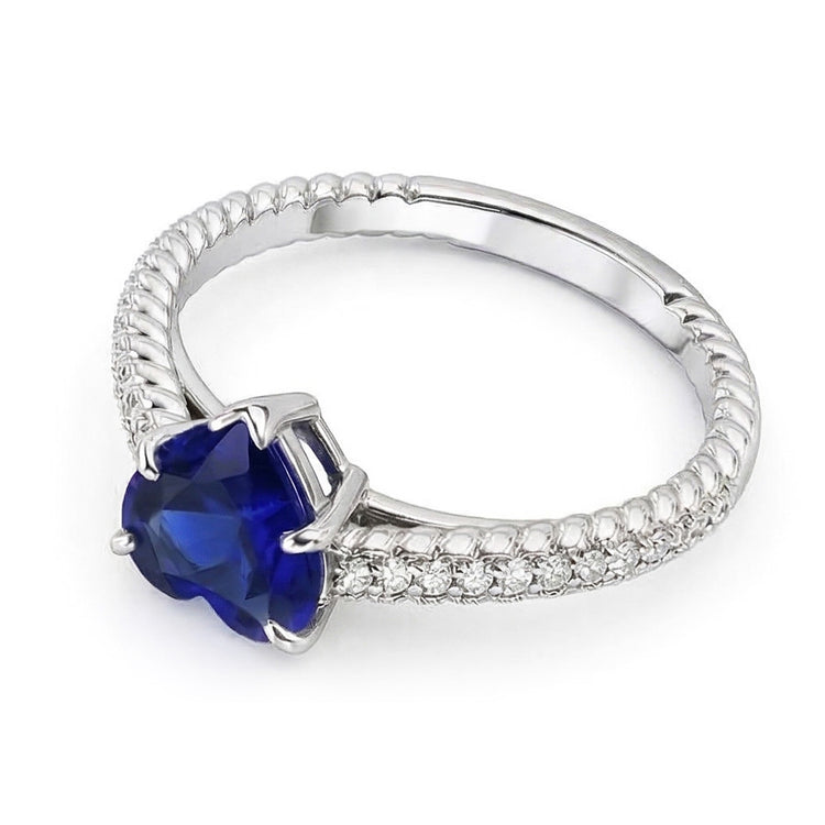 Bague solitaire en saphir de Ceylan et serti pavé. accents de diamants 2.50 carats